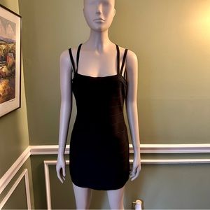 NWT HERVE LEGER- Perfect for a night out, this flattering little black dress. L